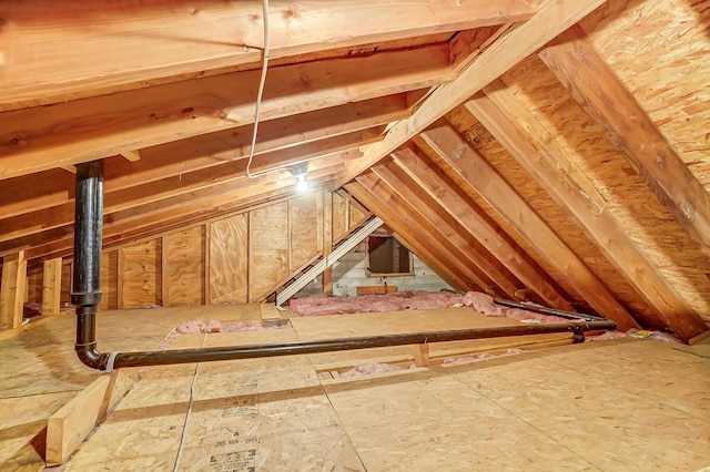 view of unfinished attic