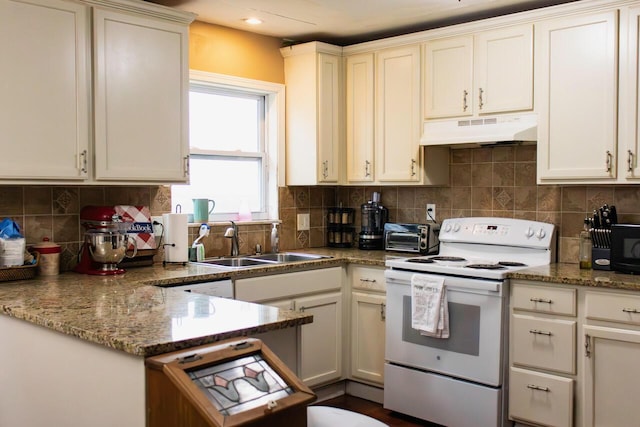 kitchen featuring under cabinet range hood, white electric range, a sink, backsplash, and a toaster