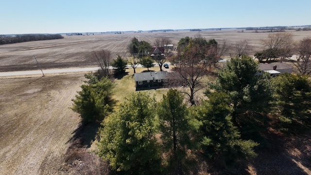 birds eye view of property with a rural view