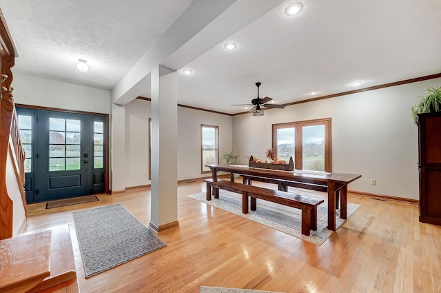 entryway with ceiling fan, baseboards, ornamental molding, recessed lighting, and light wood-style floors