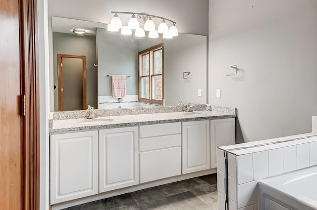 bathroom with double vanity and a sink