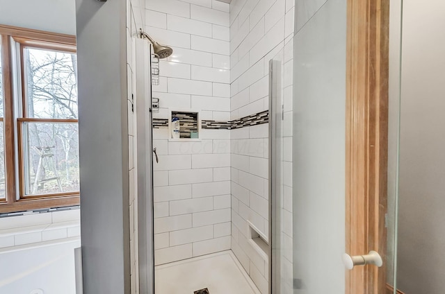 full bath with a shower stall