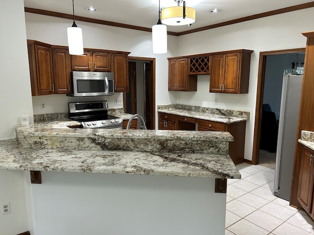 kitchen with decorative light fixtures, crown molding, appliances with stainless steel finishes, light stone counters, and a peninsula