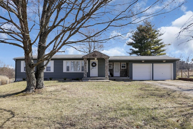 single story home featuring driveway, a front lawn, and a garage