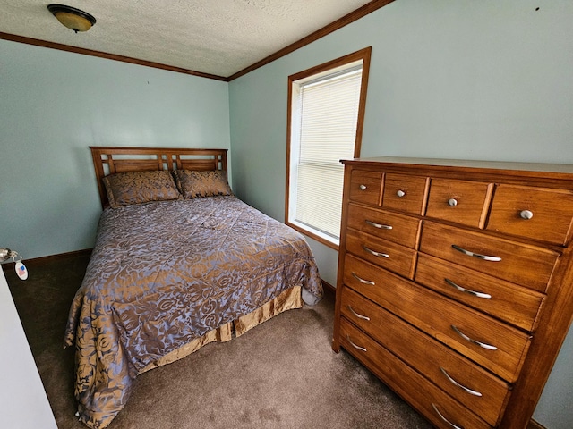 bedroom with multiple windows, a textured ceiling, crown molding, and dark colored carpet