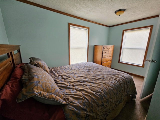 carpeted bedroom featuring multiple windows, a textured ceiling, baseboards, and ornamental molding