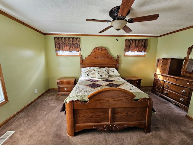 bedroom featuring carpet, baseboards, visible vents, ornamental molding, and a textured ceiling