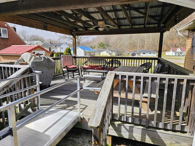 view of dock with a wooden deck