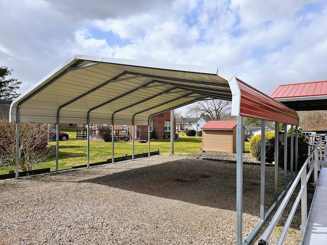 view of car parking with a shed