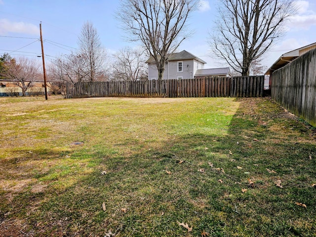 view of yard featuring fence