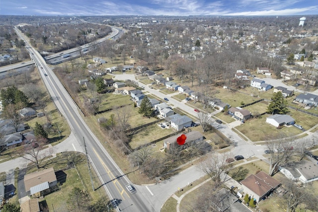 birds eye view of property with a residential view