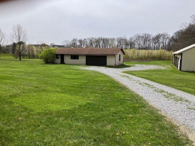 6980 S Old State Rd, Lewis Center, OH 43035 - view of yard with an outdoor structure and driveway