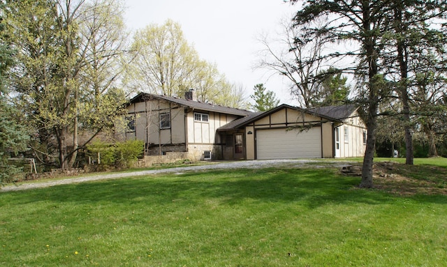 6980 S Old State Rd, Lewis Center, OH 43035 - view of front of house with an attached garage, a front lawn, and driveway
