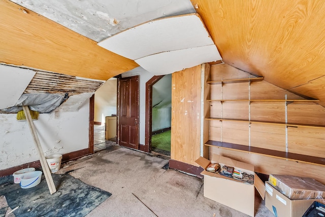 additional living space with lofted ceiling