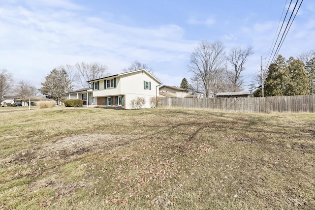 view of yard with fence