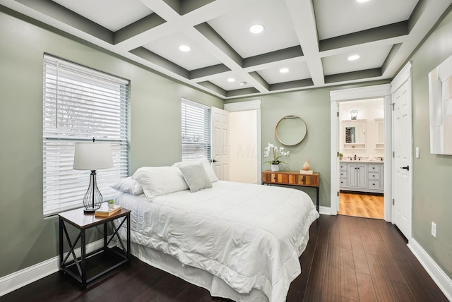 bedroom with baseboards and coffered ceiling