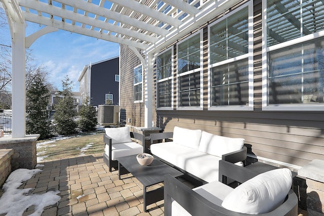 view of patio / terrace featuring outdoor lounge area and a pergola