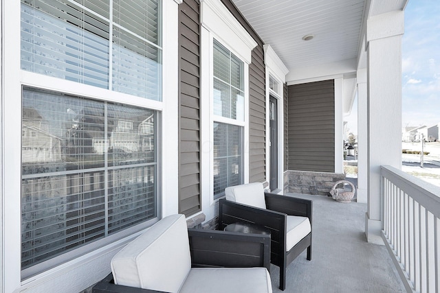 balcony featuring a porch