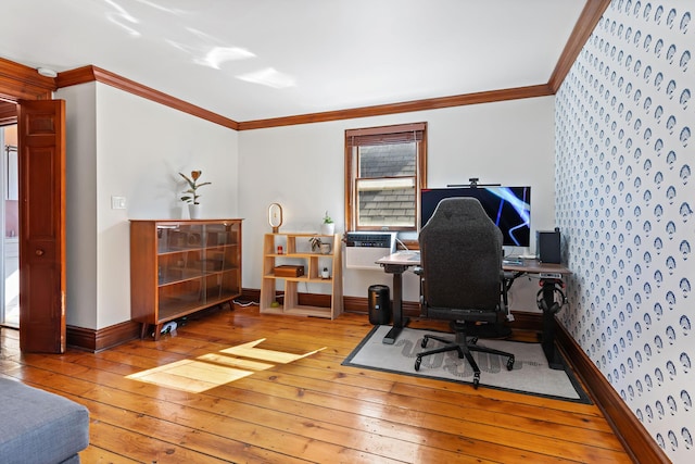 office with crown molding, baseboards, and hardwood / wood-style floors