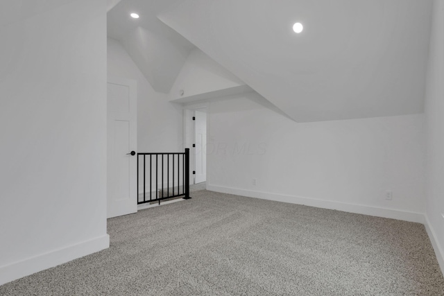 bonus room featuring recessed lighting, baseboards, carpet, and lofted ceiling