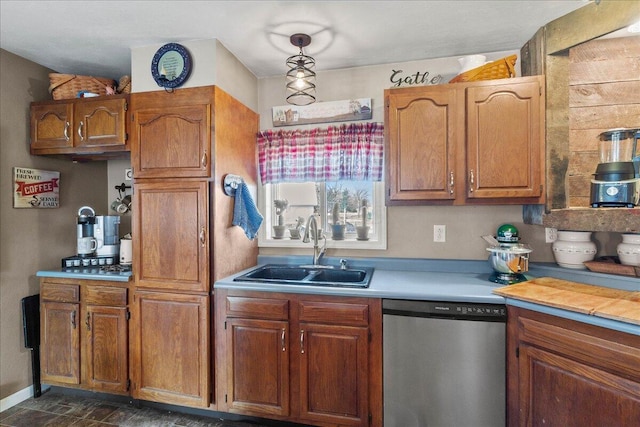 kitchen featuring brown cabinetry, dishwasher, light countertops, and a sink