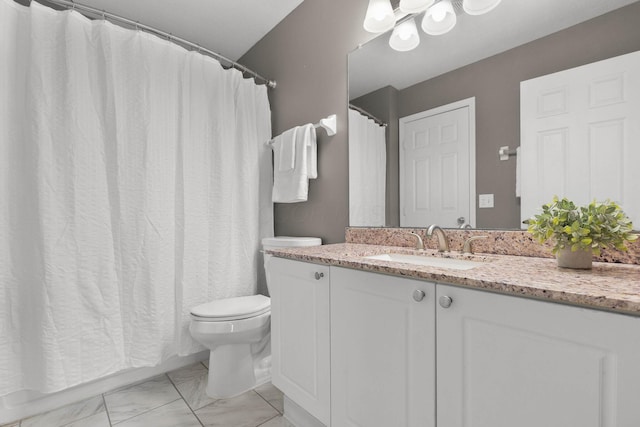 bathroom with marble finish floor, toilet, vanity, and an inviting chandelier