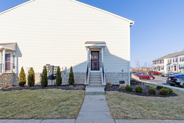 exterior space with a front yard