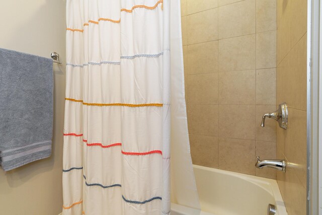 full bath featuring shower / bath combination with curtain