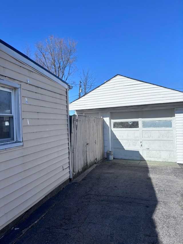 garage with fence