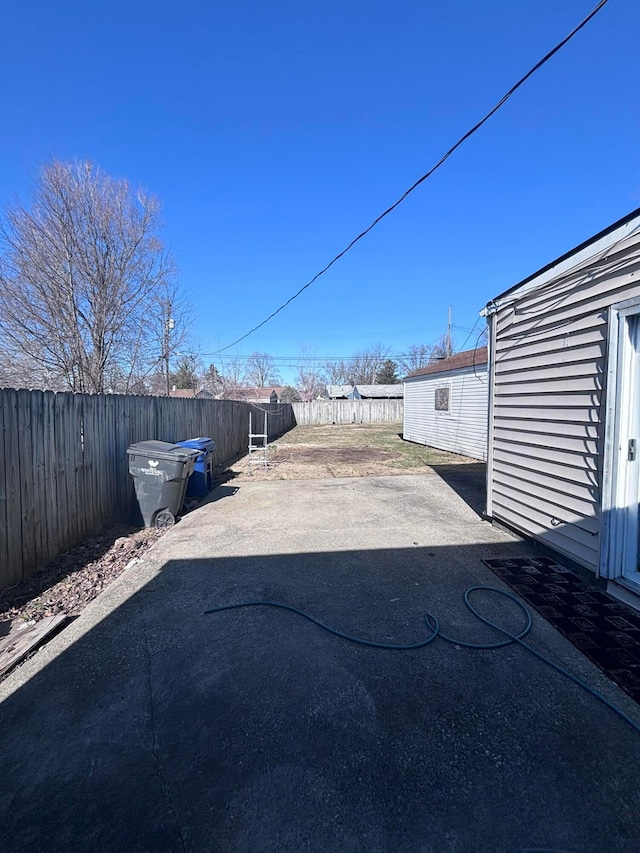 view of street featuring aphalt driveway