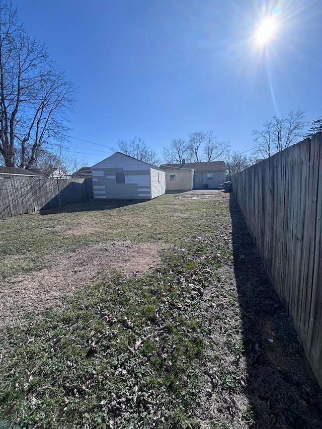 view of yard featuring a fenced backyard