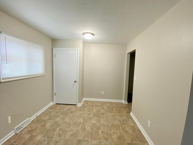 1309 Shanley Dr, Columbus, OH 43224 - spare room with baseboards
