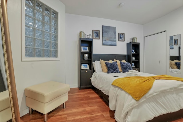 bedroom featuring wood finished floors