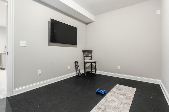 exercise area with baseboards