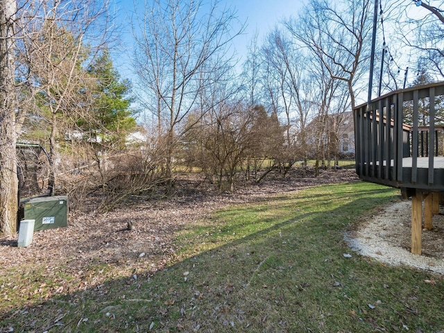 view of yard with a wooden deck