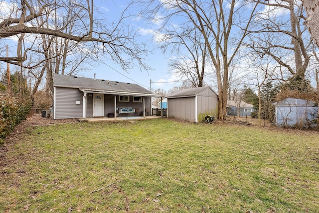 336 E Plum St, Westerville, OH 43081 - view of yard featuring a patio area, a shed, an outbuilding, and fence