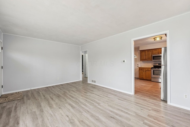 336 E Plum St, Westerville, OH 43081 - unfurnished room with visible vents, light wood-style flooring, baseboards, and ornamental molding