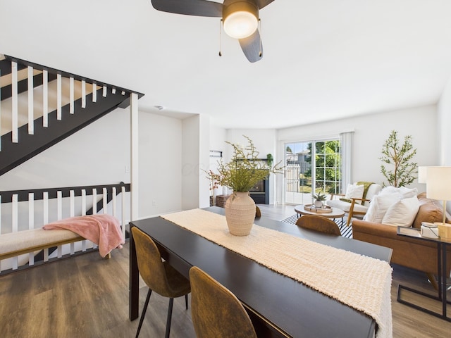 dining area with wood finished floors