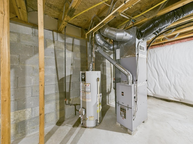 utility room featuring heating unit and water heater