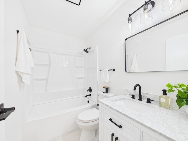 bathroom featuring vanity, shower / bathing tub combination, and toilet