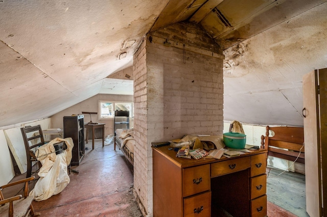 additional living space featuring lofted ceiling