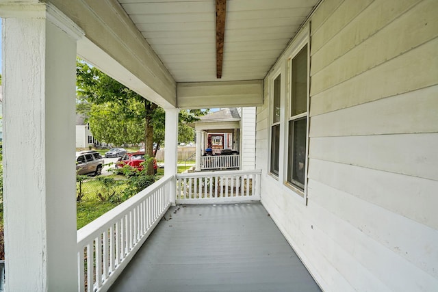 balcony featuring a porch