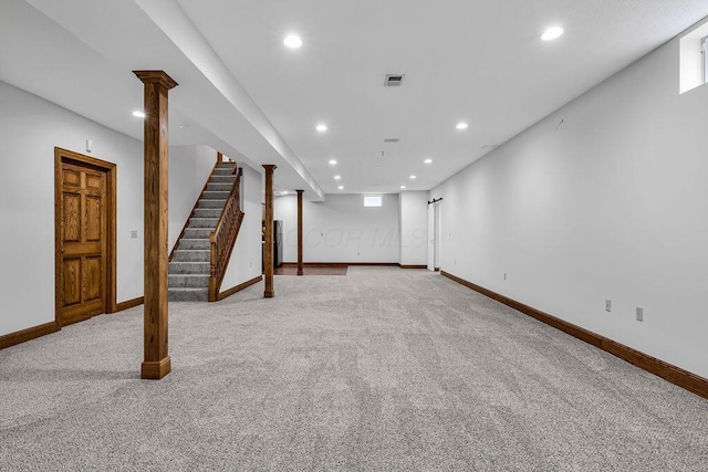 finished below grade area with carpet, stairway, recessed lighting, and visible vents