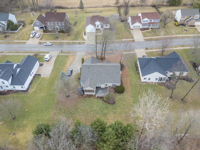 birds eye view of property with a residential view