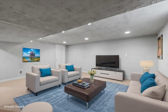 living room with recessed lighting, baseboards, and carpet floors