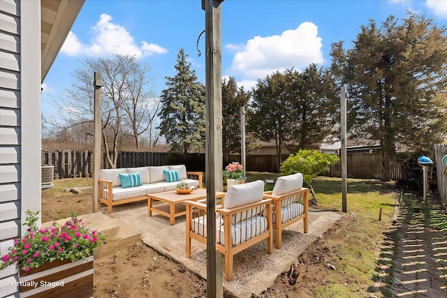 view of patio / terrace featuring an outdoor living space and a fenced backyard