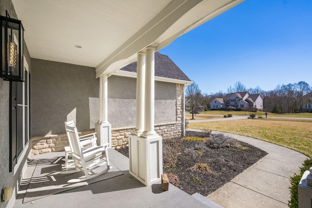 view of patio with a residential view