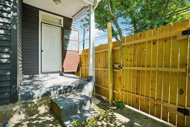 view of patio / terrace featuring a gate and fence