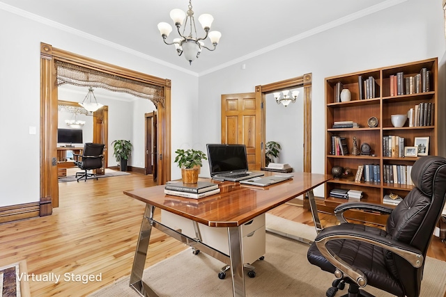 529 S 3rd St, Columbus, OH 43215 - office area featuring a chandelier, light wood finished floors, and ornamental molding