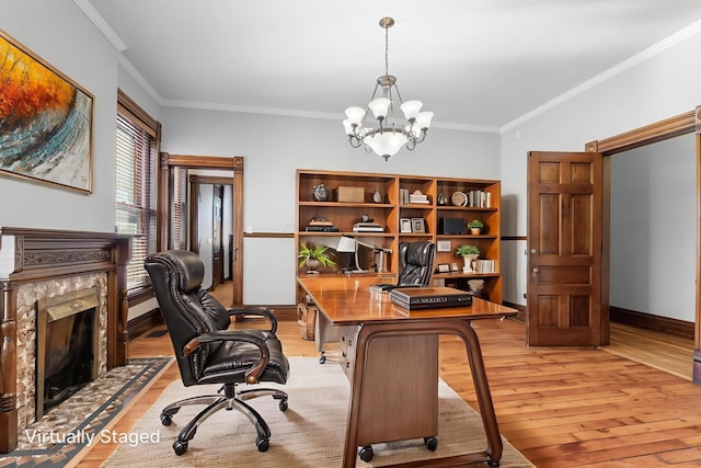 529 S 3rd St, Columbus, OH 43215 - office space with light wood-style floors, a chandelier, ornamental molding, and a fireplace